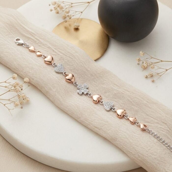 Elegant women bracelet with heart charms and clover centerpiece