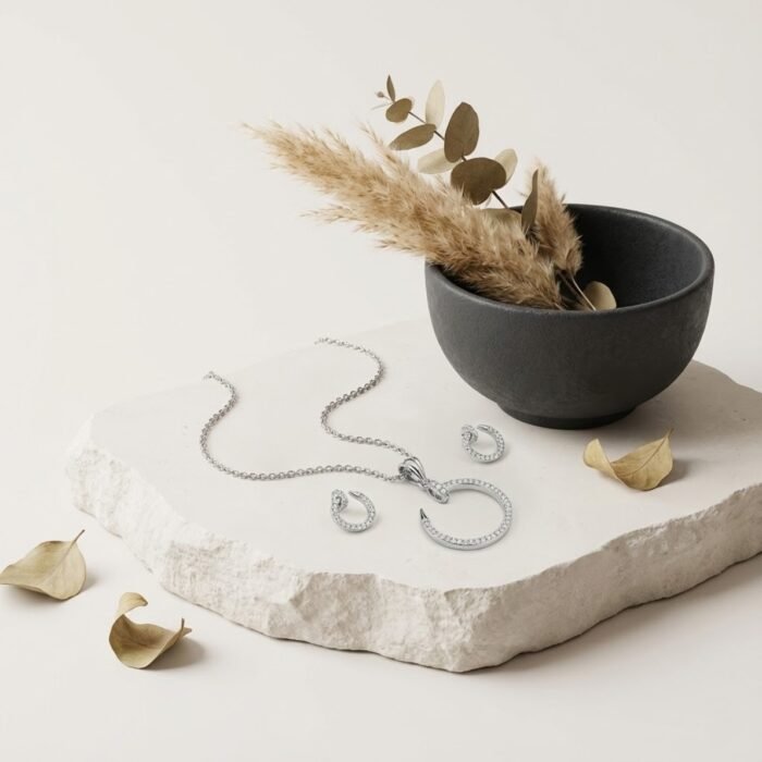 Premium silver designer anklet for women displayed on stone surface – lightweight CZ anklet