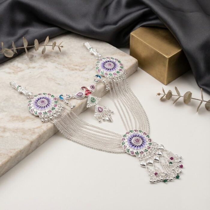 Premium multi-color silver bridal kandora with layered chains and traditional detailing displayed on marble surface